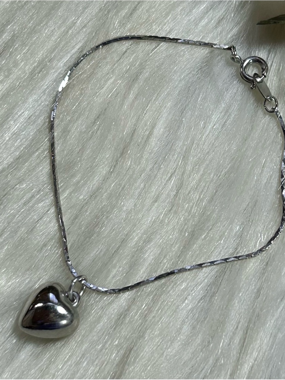 Heart charm silver tone bracelet